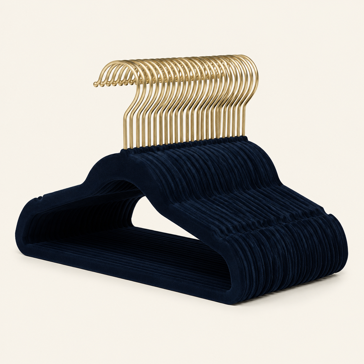 Thirty navy velvet clothes hangers with brass-colour hooks